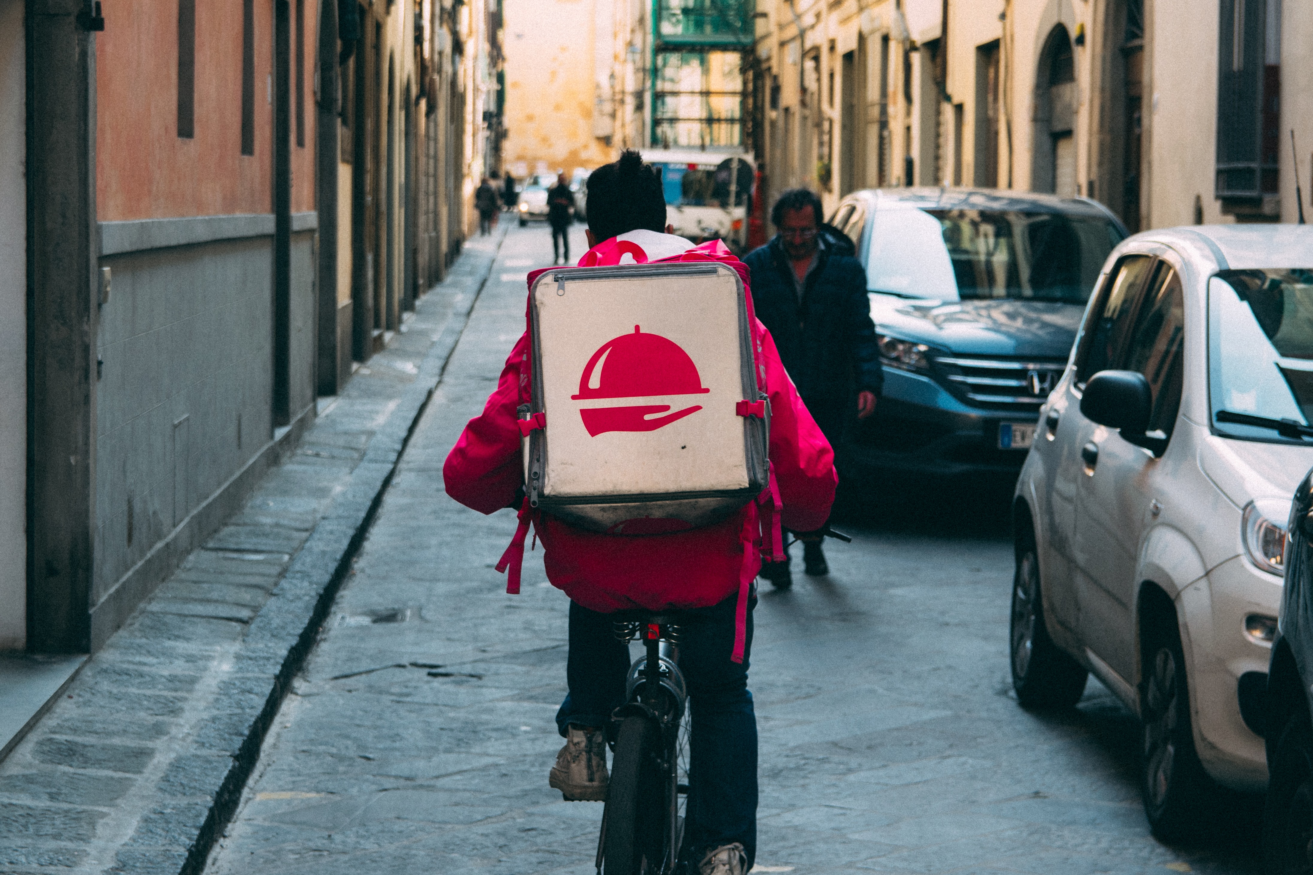 delivery worker on bike