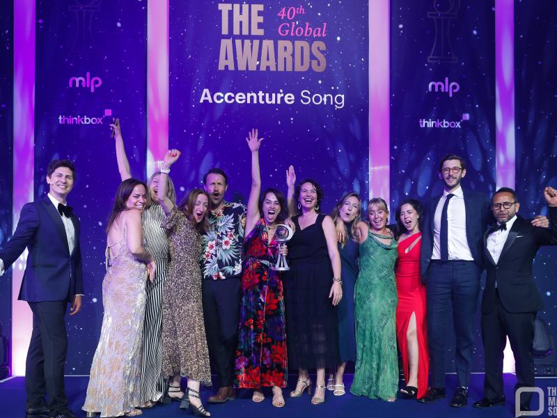 Group of people winning an award