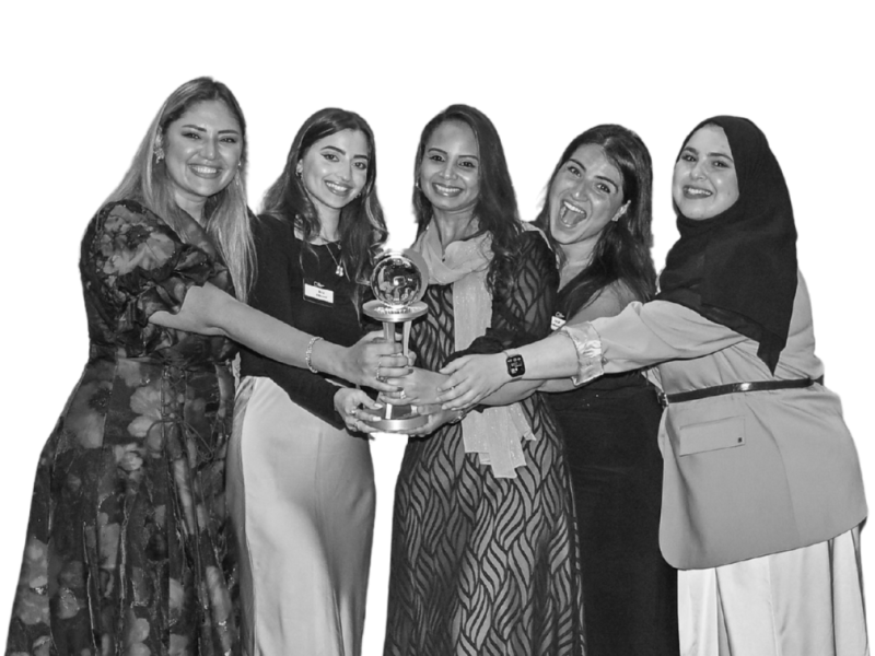 Winners holding the trophy