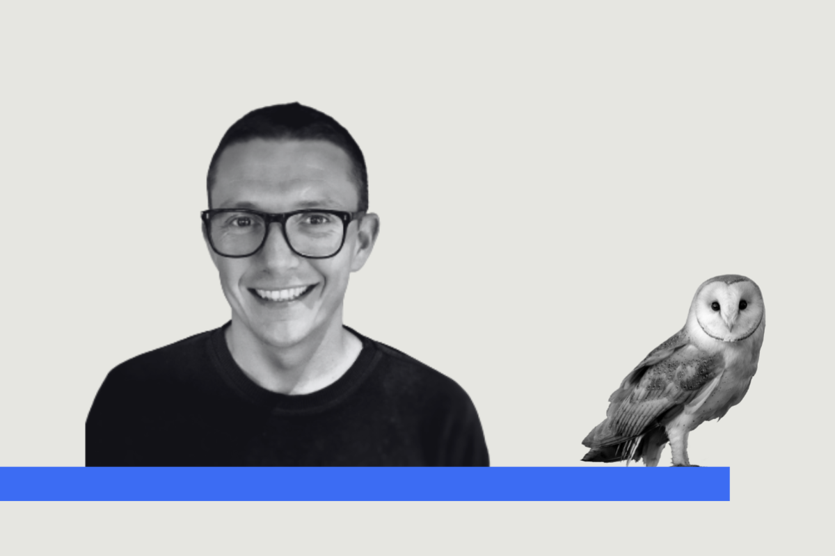 Sam Reid and Wise Owl porched on a branch