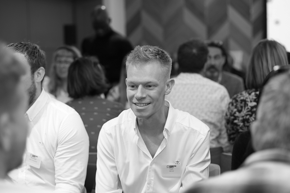 People talking and smiling