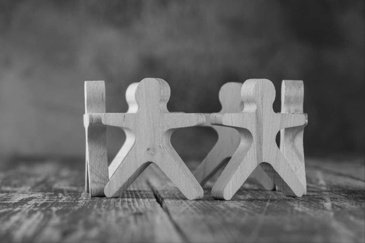 Wooden figurines standing in a circle