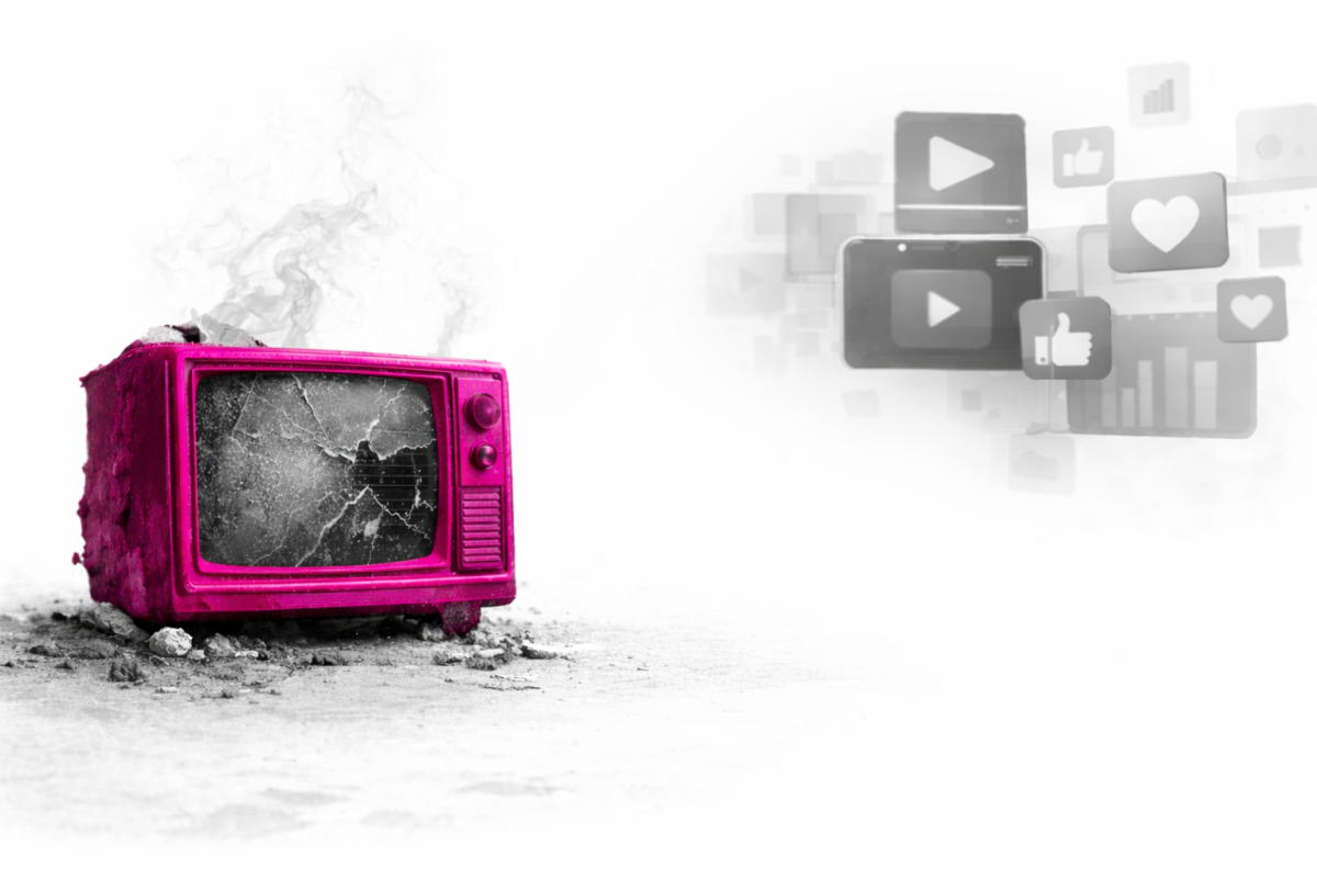 A cracked vintage CRT television with a bright pink frame sits on a dusty surface with small debris around it. Light smoke rises from the top of the set, while faint, semi transparent digital media icons float to the right, suggesting a contrast between traditional television and modern digital platforms.