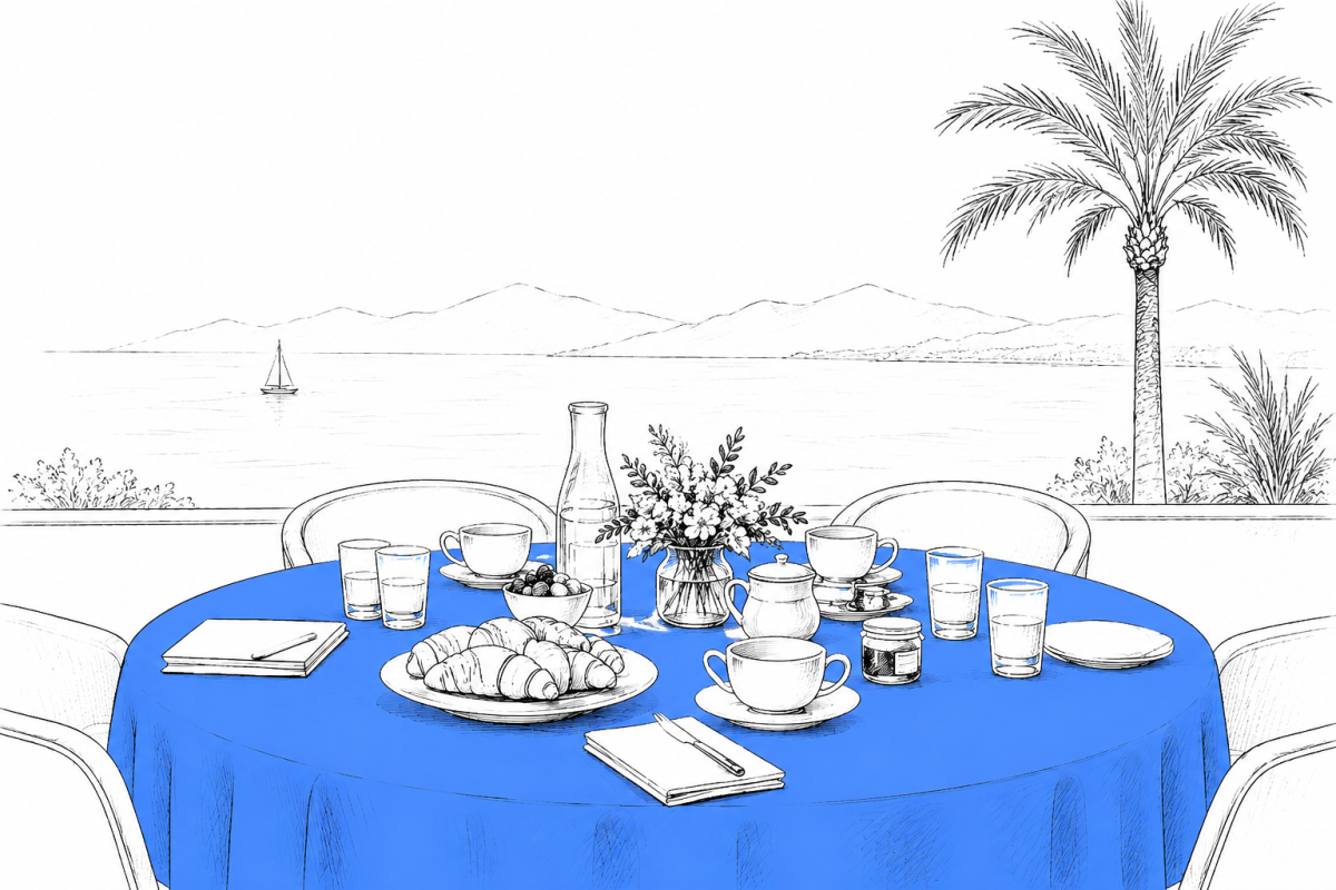 Minimalist sketch-style illustration of a seaside breakfast table set for a meeting, featuring a bright blue tablecloth, pastries, coffee cups, notebooks, and flowers, overlooking a calm coastal view with distant hills and a single palm tree.