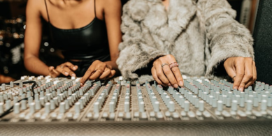 Mixing board two woman using it 