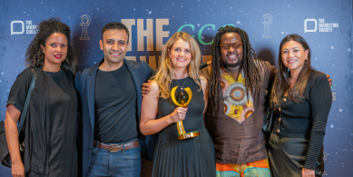 People holding the GCC Awards trophy