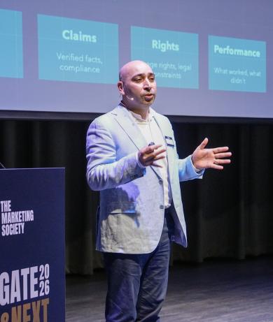 Hadi looking at the audience while speaking
